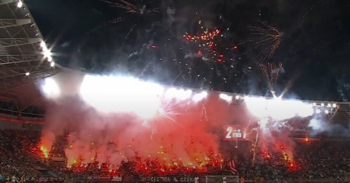 Chelsea match stopped as Servette fans unleash fireworks from the stands in chaotic scenes