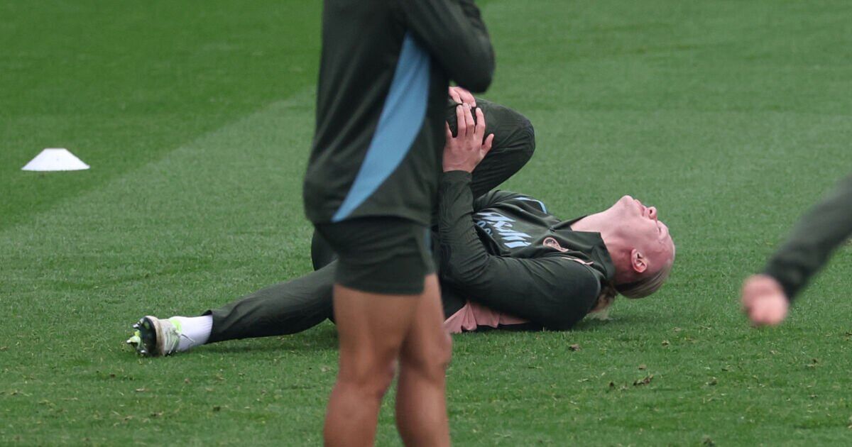 Erling Haaland goes down injured and screams in pain during Man City training